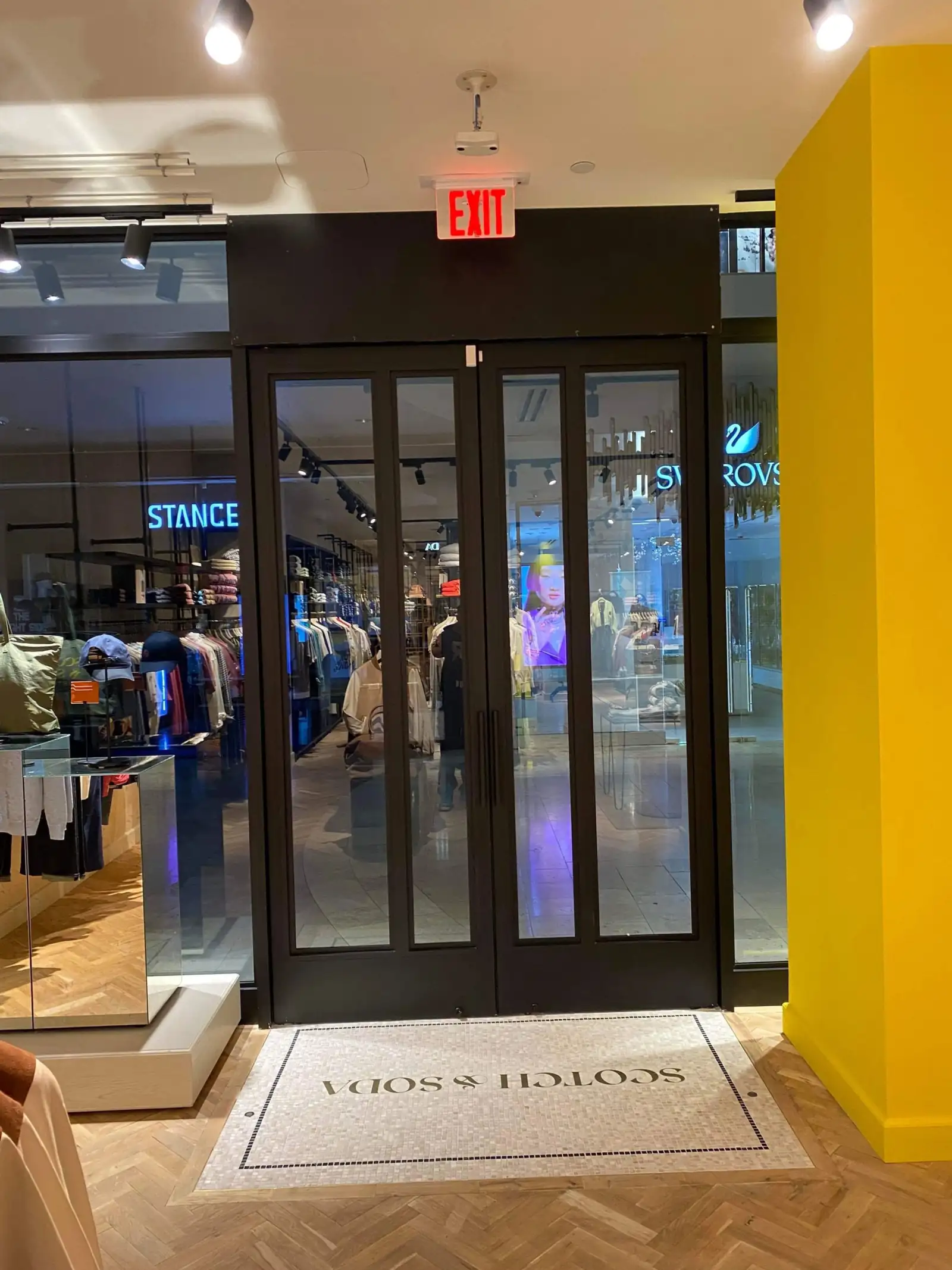 Retail storefront entrance with cleaned glass and polished entry flooring